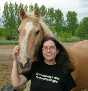 Roy, a beautiful palomino horse, standing with me