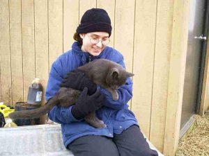 Lisa with Diggy outside barn