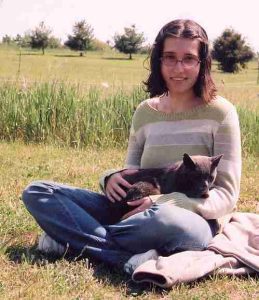 Lisa with Diggy on lawn
